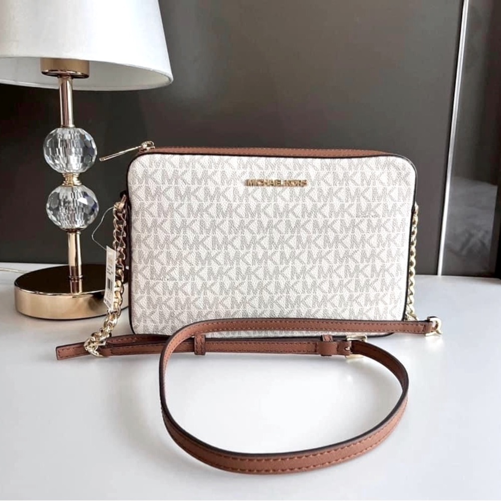Michael kors jet set East West large crossbody vanilla color bag